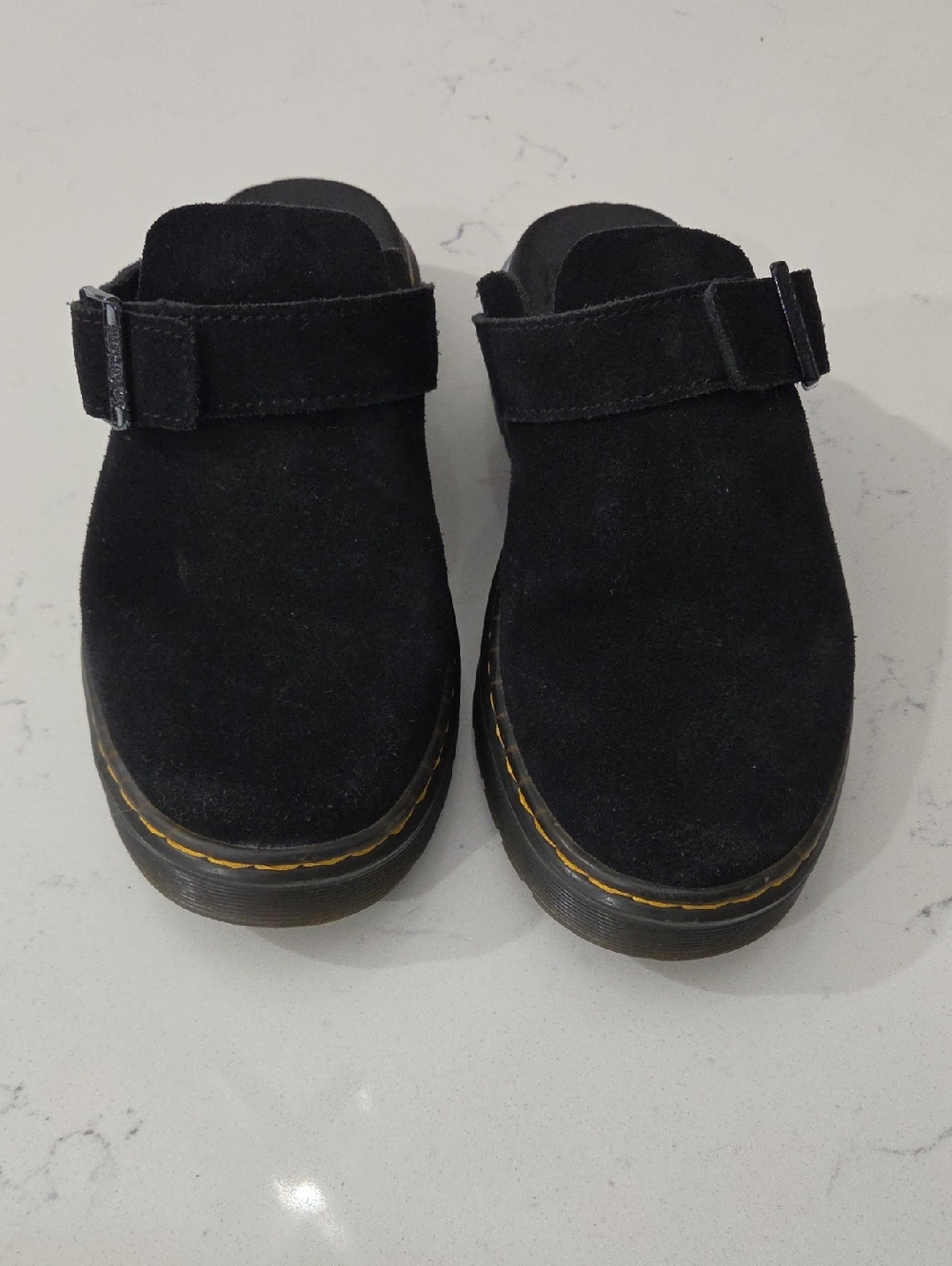 Dr. Martens Carlson Mules in black suede.